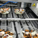 Linea preparazione e confezionamento insalata di mare