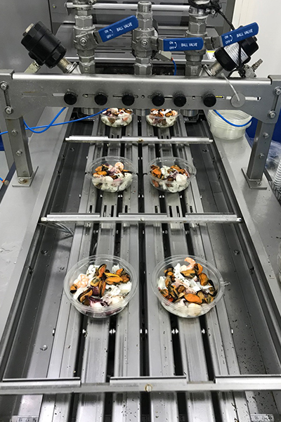 Linea preparazione e confezionamento insalata di mare